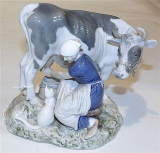A Bing & Grondahl Porcelain Figural Group, Height of first 7 inches.