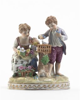 A Dresden Porcelain Figural Group, Height 4 3/4 inches.
