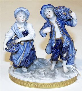 A Volkstedt Porcelain Figural Group, Height 5 3/4 inches.