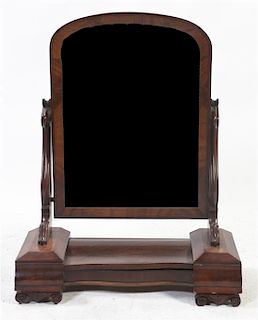 A Victorian Mahogany Shaving Mirror, Height 33 1/4 inches.