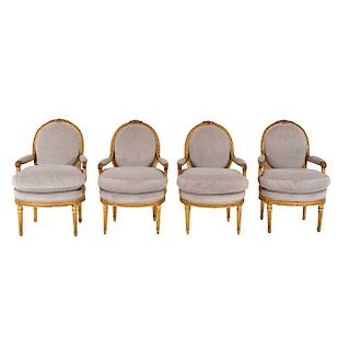 A LOT OF ARMCHAIRS, FRANCE, 19TH CENTURY. With four fluted supports each. Four pieces.  