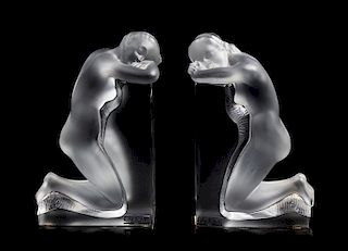 A Pair of Lalique Reverie Bookends Height 8 5/8 x width 5 1/4 x depth 2 inches