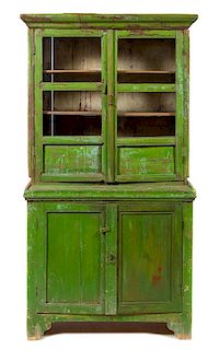 A Rustic Green-Painted Bookcase Height 78 x width 41 x depth 22 inches.