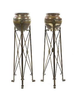 A Pair of Art Nouveau Style Patinated Metal Jardiniere Stands, Height 45 1/2 inches.