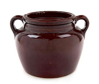 A Glazed Stoneware Handled Crock Height 5 3/4 inches.