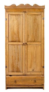 A Rustic Pine Armoire Height 81 1/2 x width 37 x depth 17 1/2 inches.