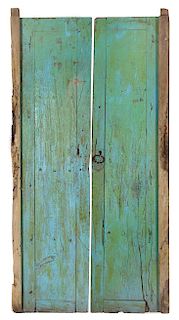 A Pair of Turquoise Painted Doors Height 85 1/4 x width 23 inches.