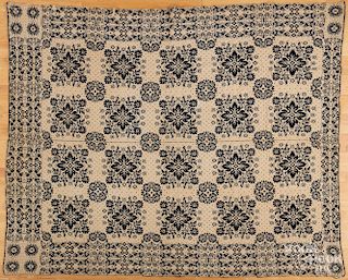 Pair of blue and white coverlets, dated 1838.
