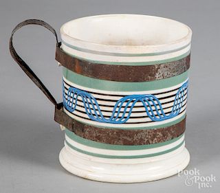 Large mocha mug with make-do repair, 6 3/4" h.