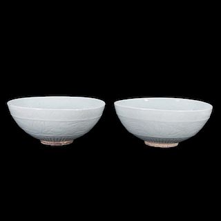 Pair of 19th century Chinese celadon bowls.