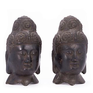 Two Chinese bronze Buddha heads.