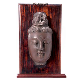 Bronze Buddha head.