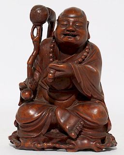 A Chinese carved wood Wiseman.