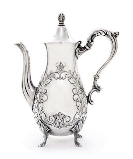 A Silver Coffee Pot, Probably American, Early 20th Century, Height 9 5/8 inches.