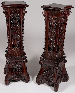 A PAIR OF ORNATE PIERCED CARVED STANDS