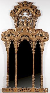 A CHINESE CARVED GILT WOOD MIRRORED FRAME
