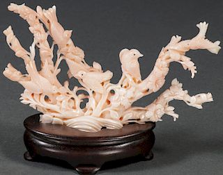 A CHINESE PINK CORAL CARVED GROUPING