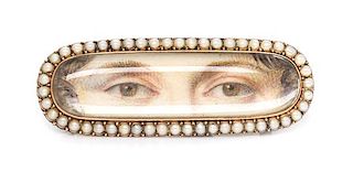 * A Georgian Yellow Gold and Seed Pearl Double Lover's Eye Plaque, 3.70 dwts.
