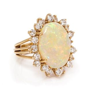 * A 14 Karat Yellow Gold, Opal and Diamond Ring, Pacific Gem Co., 5.90 dwts.