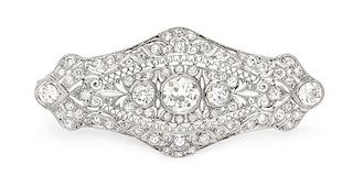 * An Art Deco Platinum and Diamond Pendant/Brooch, 11.90 dwts.