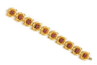 An 18 Karat Yellow Gold and Ruby Flower Bracelet, Tiffany & Co., Italy, 31.90 dwts.