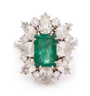 An 18 Karat White Gold, Emerald and Diamond Ring, 4.10 dwts.