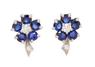 A Pair of Platinum, Sapphire and Diamond Flower Cluster Earclips, Oscar Heyman & Brothers, 2.60 dwts.