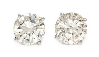 A Pair of 18 Karat White Gold and Diamond Stud Earrings, 1.40 dwts.