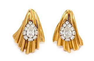 A Pair of Yellow Gold, Platinum and Diamond Earclips, 20.20 dwts.