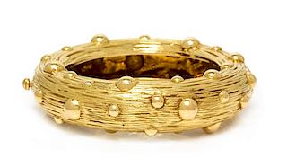 An 18 Karat Yellow Gold Bangle Bracelet, Tiffany & Co., Circa 1968-1969, 66.05 dwts.
