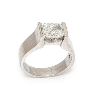 * A 14 Karat White Gold and Diamond Solitaire Ring, 5.80 dwts.