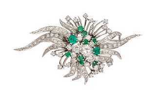 A Platinum, Diamond and Emerald Spray Brooch, French, 11.80 dwts.