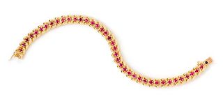 An 18 Karat Yellow Gold and Ruby Bracelet, Van Cleef & Arpels, 36.60 dwts.