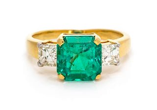 * A Yellow Gold, Emerald and Diamond Ring, 3.20 dwts.