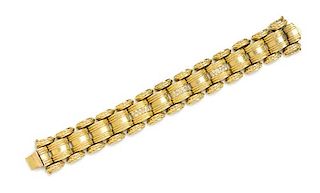 A 14 Karat Yellow Gold and Diamond Bracelet, 49.75 dwts.
