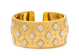 An 18 Karat Bicolor Gold and Diamond Cuff Bracelet, Mario Buccellati, 51.30 dwts.