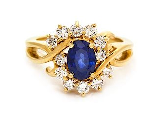 An 18 Karat Yellow Gold, Sapphire and Diamond Ring, 6.25 dwts.