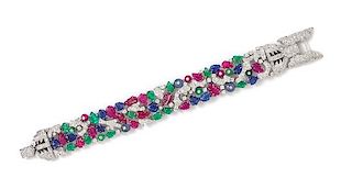 A White Gold, Diamond, Carved Ruby, Sapphire and Emerald Bracelet, 40.20 dwts.