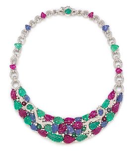 An 18 Karat White Gold, Diamond, Carved Ruby, Sapphire, and Emerald Necklace, 58.70 dwts.