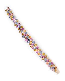 An 18 Karat White Gold, Multicolor Sapphire and Diamond Bracelet, 18.50 dwts.