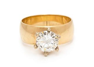 A 14 Karat Yellow Gold and Diamond Solitaire Ring, 4.20 dwts.