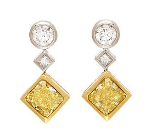 A Pair of Platinum, 18 Karat Yellow Gold, Fancy Vivid Yellow and Fancy Intense Yellow Diamond Earrings, Michael Beaudry, 9.00 dw