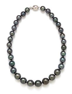 A 14 Karat White Gold and Graduated Cultured Tahitian Pearl Necklace, Tasaki, 49.20 dwts.
