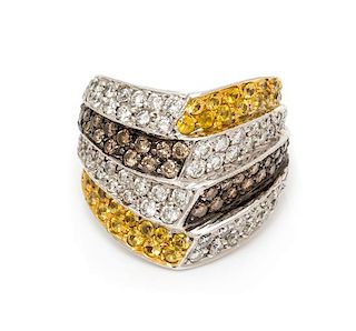 An 18 Karat White Gold, Diamond and Colored Diamond Ring, 9.60 dwts.