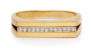 An 18 Karat Yellow Gold and Diamond Bangle Bracelet, Annaratone & Magyary, 36.60 dwts.