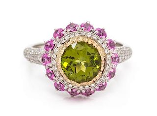 A Platinum, Yellow Gold, Peridot, Pink Sapphire and Diamond Ring, 4.30 dwts.