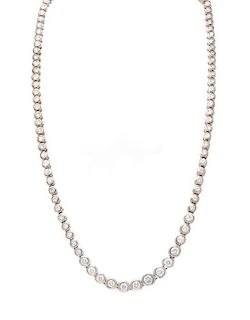 A 14 Karat White Gold and Diamond Riviere Necklace, 23.10 dwts.