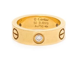 An 18 Karat Yellow Gold and Diamond 'Love' Ring, Cartier, 5.50 dwts.