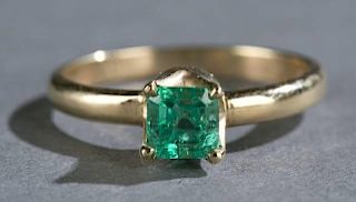 14kt gold and approx. 0.55 emerald solitaire ring.
