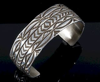 Signed Navajo Sterling Silver Carved Bracelet